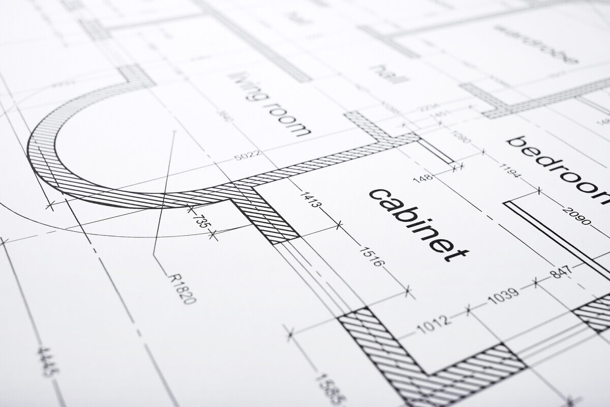 Architectural blueprint showing detailed floor plan with labeled areas like living room, cabinet, and bedroom.