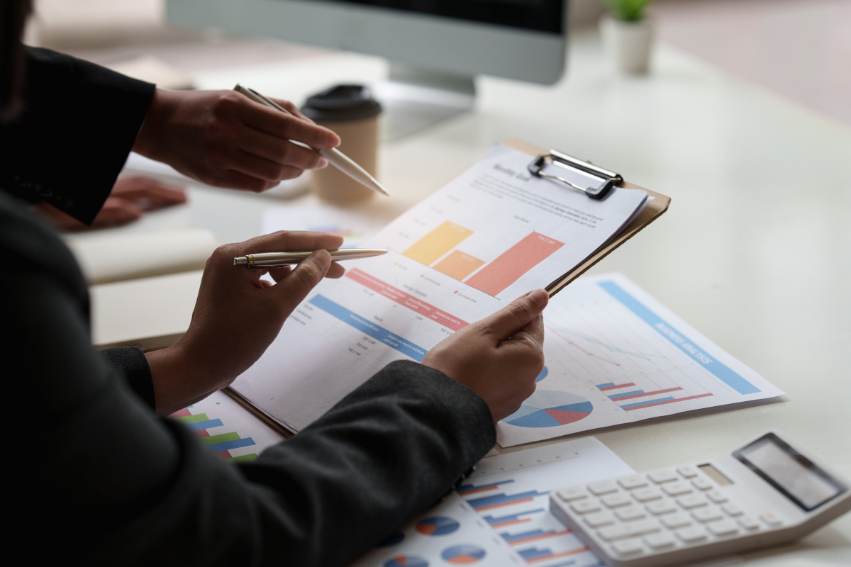 Two businessmen looking at documents